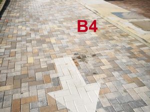 Before and after parking lot marking removal sandblasting Gainesville FL