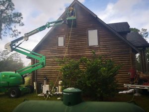 Log cabin wood surface restoration sandblasting before and after